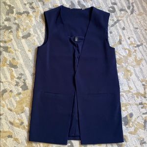 White/Black vest size 8